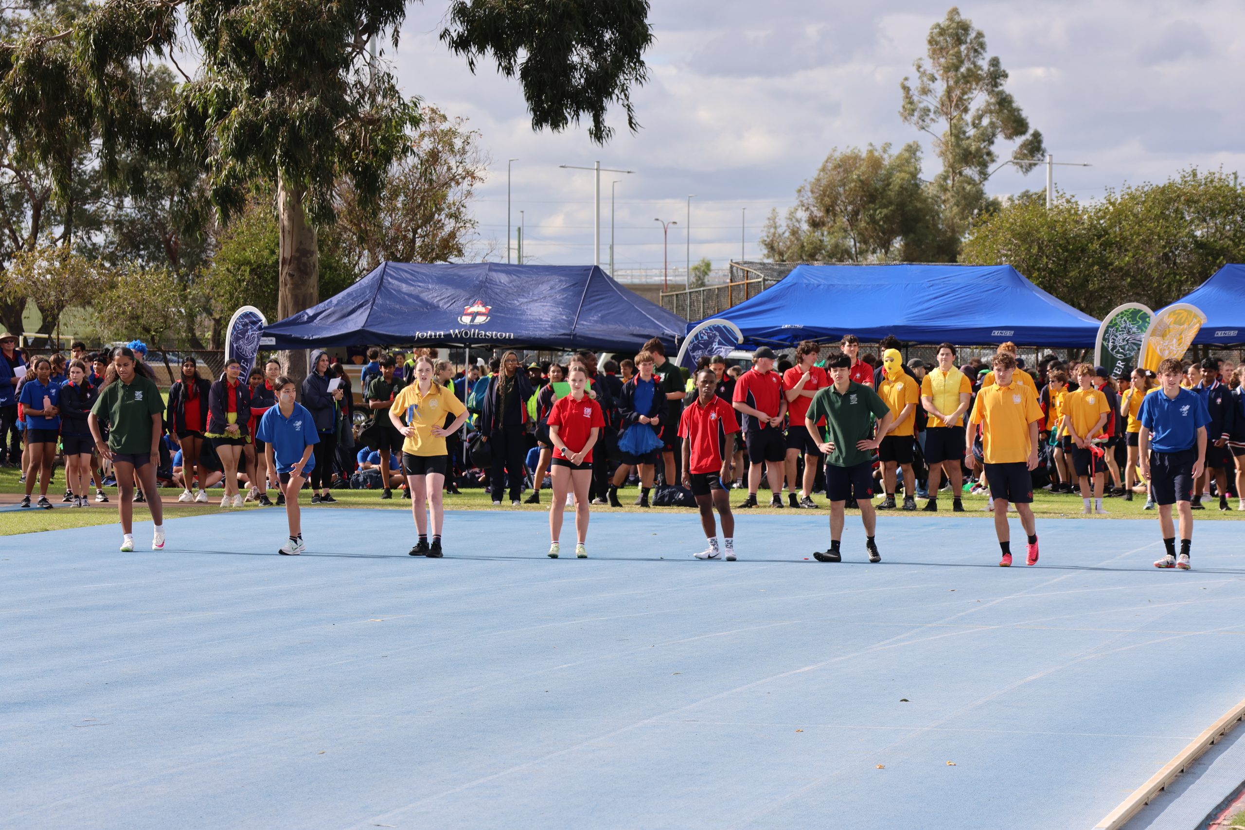 a group of people on a track